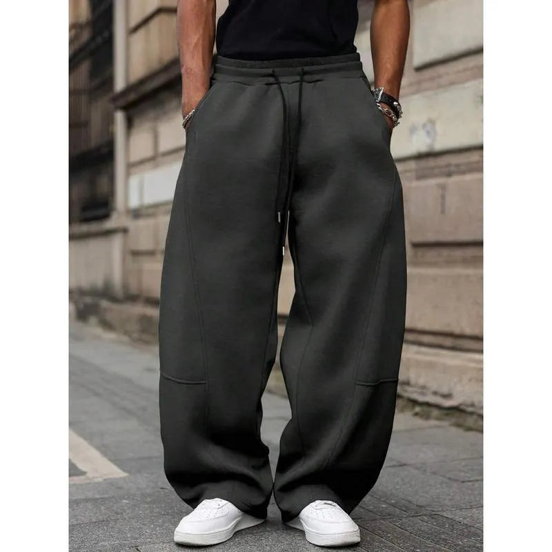 Men's straight-leg high waist casual trousers in a cropped length, shown in a dark grey colour.