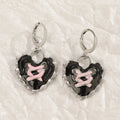 Women's alloy cross crystal earrings in white, bright black, and antique silver colours with geometric animal designs