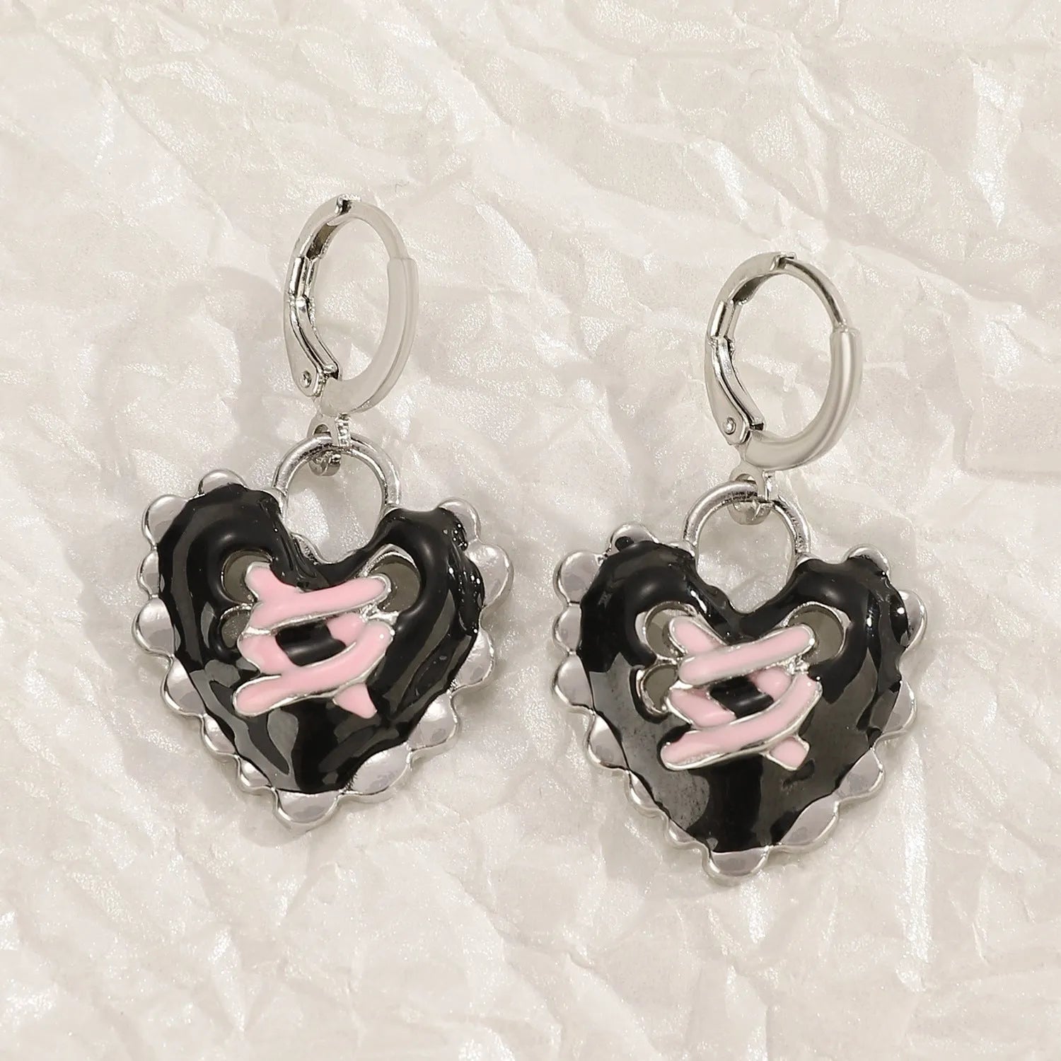 Women's alloy cross crystal earrings in white, bright black, and antique silver colours with geometric animal designs