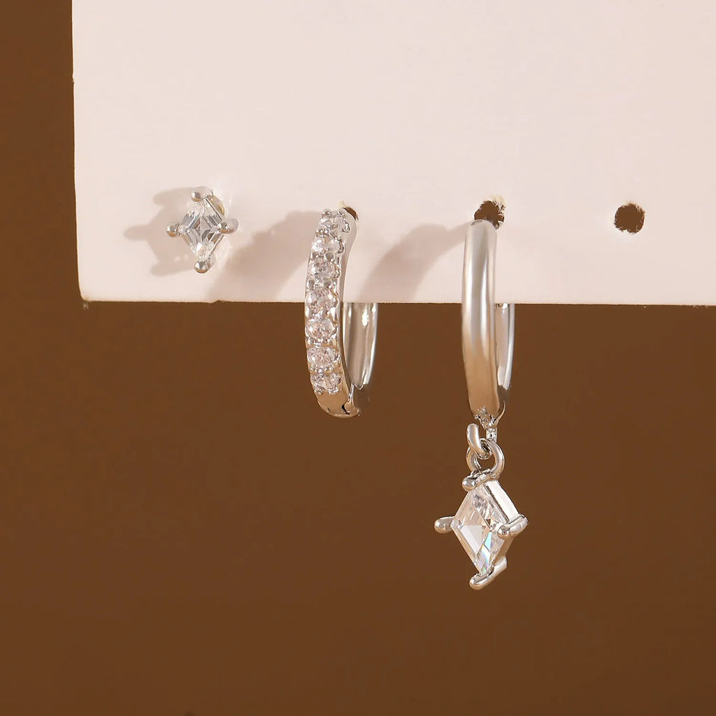 Geometric triangle and rhombus zircon earrings in gold and silver with stud, pendant, and clip styles