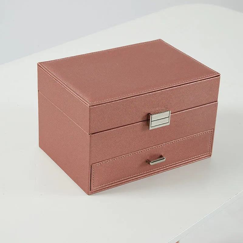 Hard-sided PU leather jewellery storage box in a solid colour.