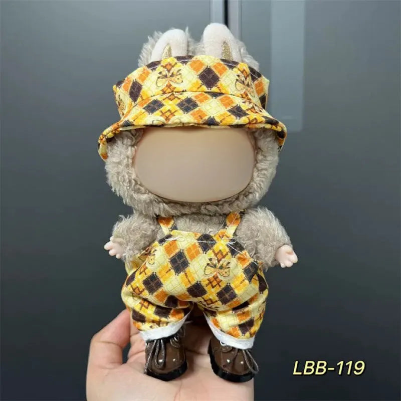 Plastic doll costume for a 17cm tall vinyl fashion figurine on a white background.