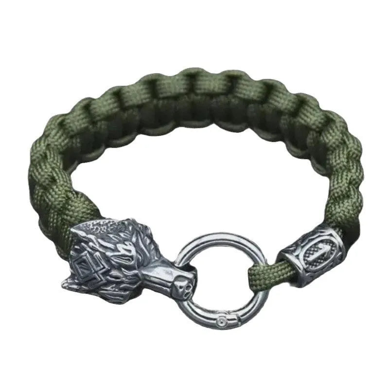 Handmade titanium steel wolf head bracelet in camouflage colour on wrist.