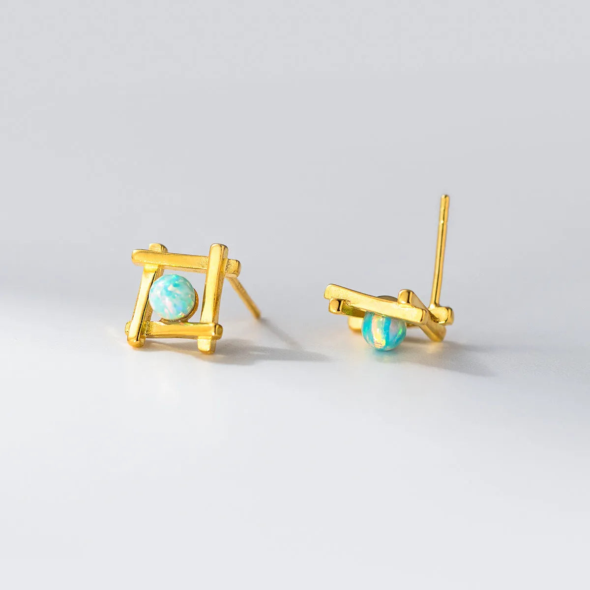 Women's geometric cross quadrangle stud earrings in 925 silver with silver or gold finish