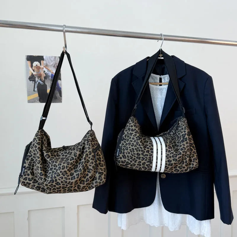 Leopard print sports style shoulder messenger bag with cross-body strap and stitching details