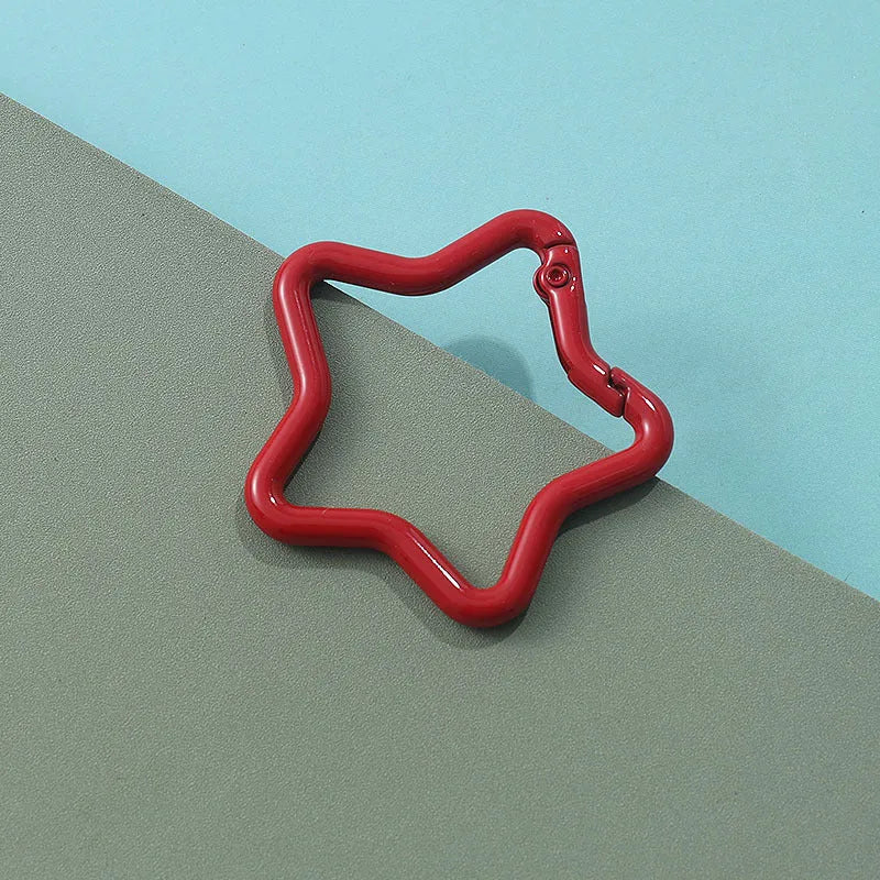 Zinc alloy five-pointed star keychain in various colours for backpack decoration