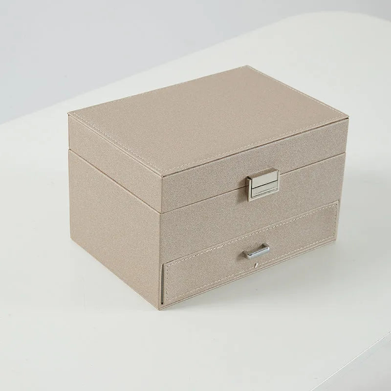 Hard-sided PU leather jewellery storage box in a solid colour.