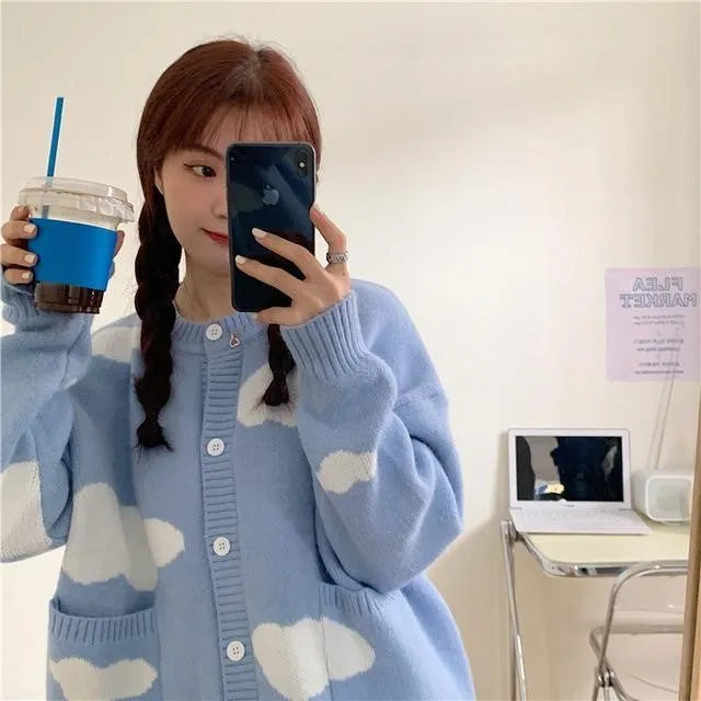Women's blue cloud pattern cardigan sweater with loose fit and long sleeves