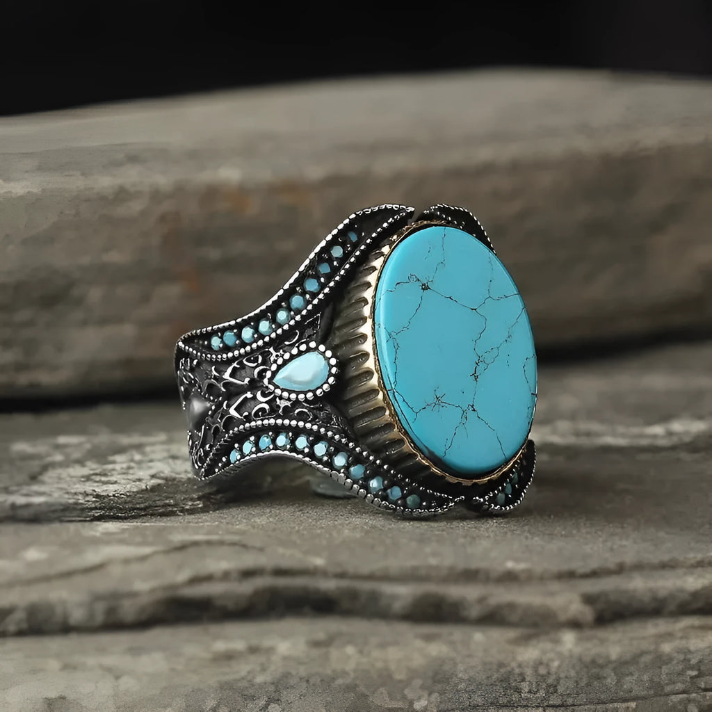 Men's antique silver alloy ring with round turquoise style design on finger