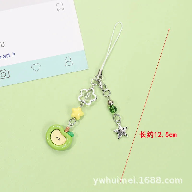 Plastic resin fruit pattern phone charm keychain pendant with apple and strawberry designs on a white rope.