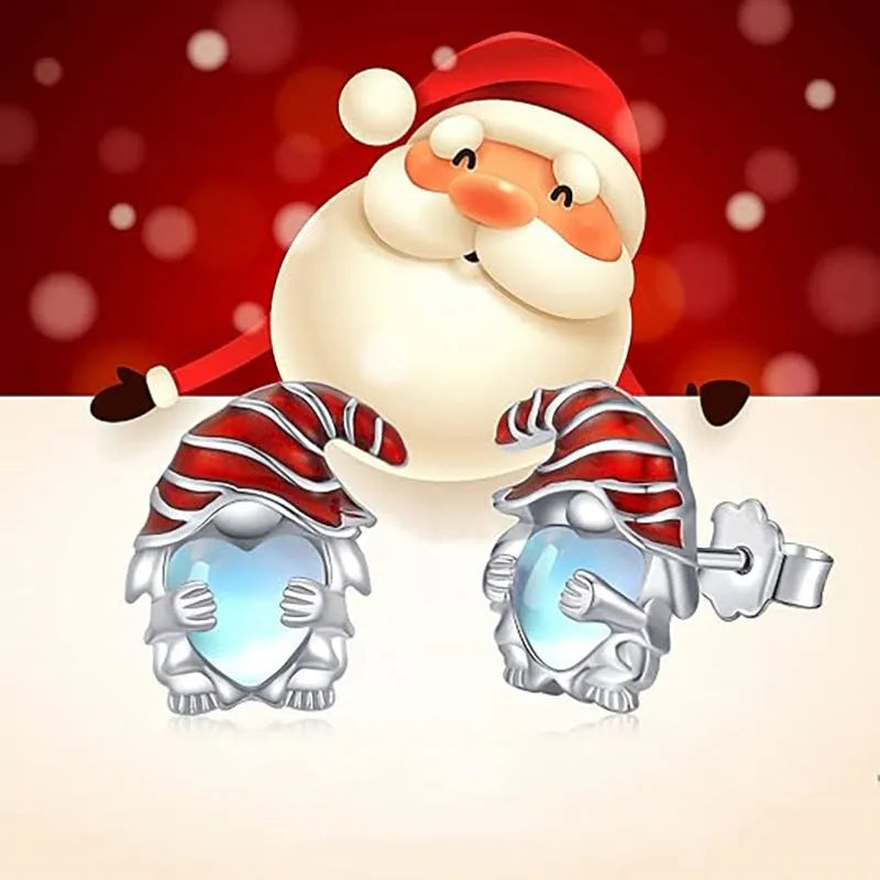 Women's copper heart-shaped earrings with a detailed Santa Claus design in white gold colour.