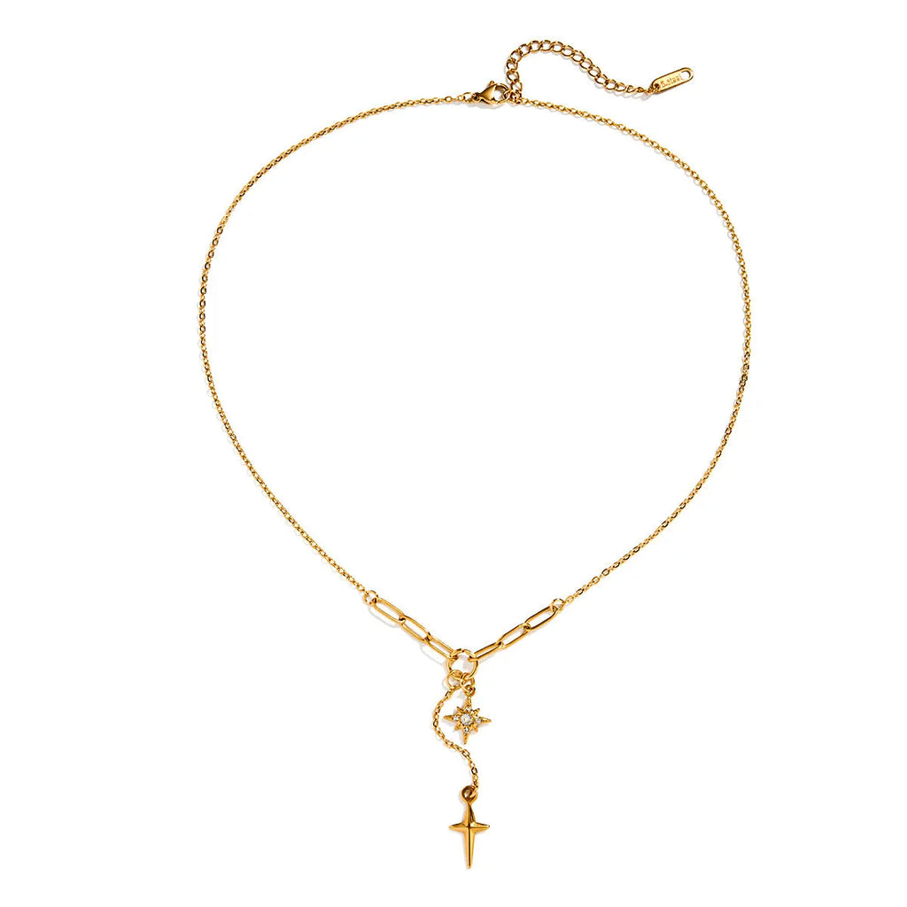 Close up of an 18K gold finish stainless steel necklace with white diamond eight-pointed stars pendant on a regular chain