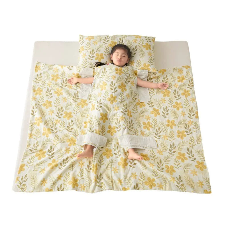 Anti-kick sleeping bag blanket in a colourful Cloud Bear Star Dream design on a bed.