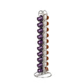 Black wrought iron coffee capsule storage rack holding pods on two shelves.