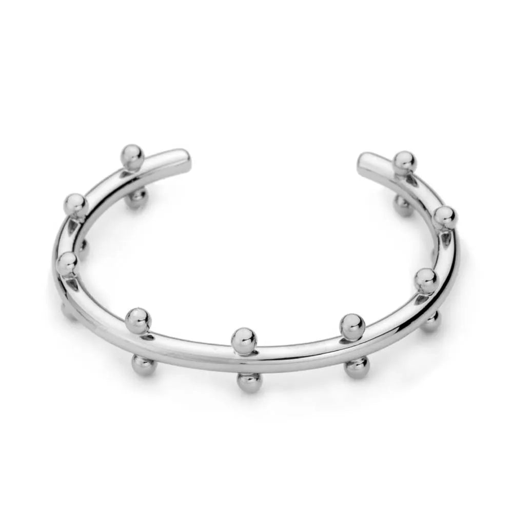 Stainless steel C-shaped bean bead with textured rivet detail in gold, silver, and two-tone finishes.