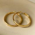 Gold and silver 40mm copper circle hoop earrings with electroplated finish