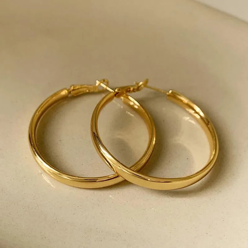 Gold and silver 40mm copper circle hoop earrings with electroplated finish