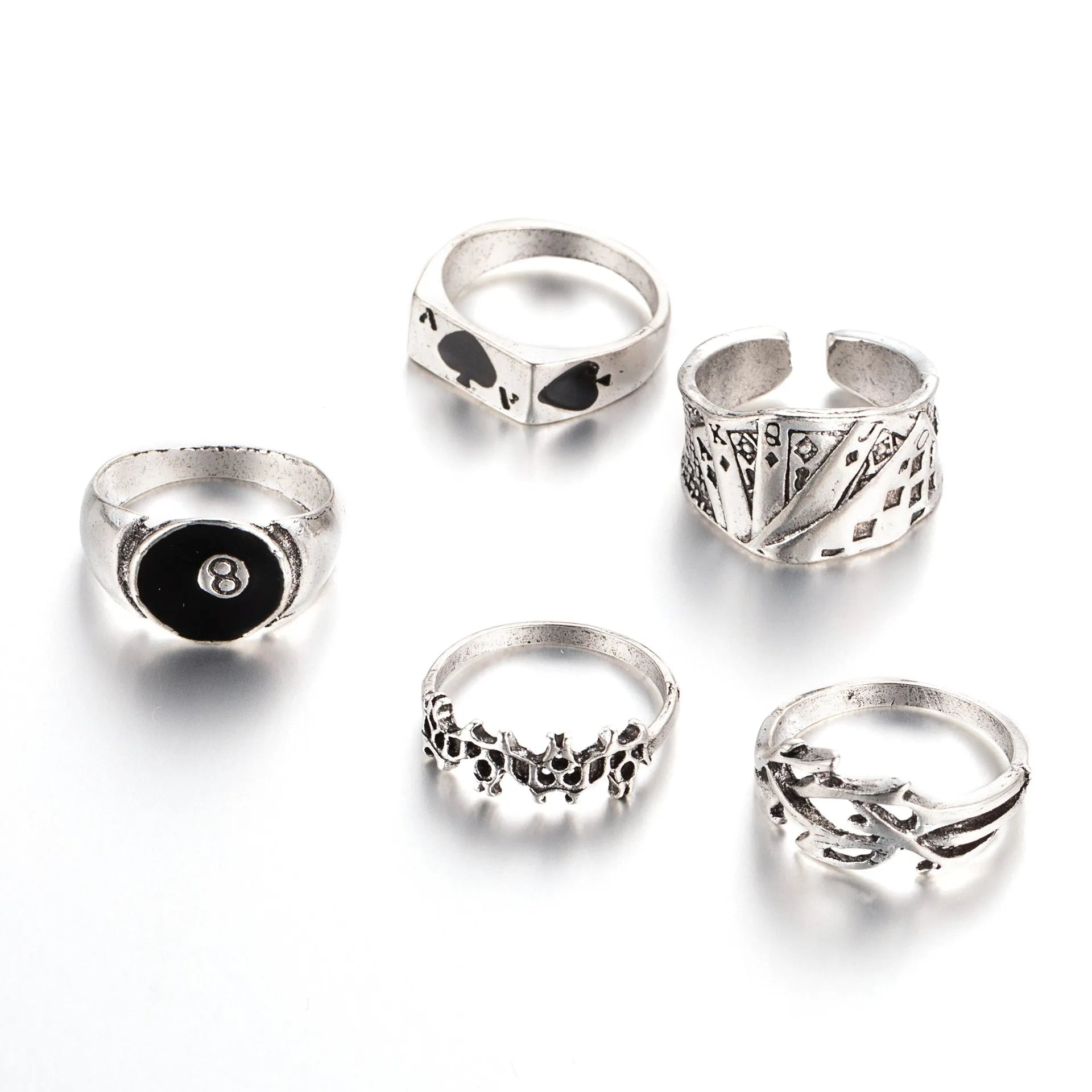 Black alloy ring with a raised retro spade card symbol and an adjustable band.