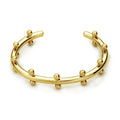 Stainless steel C-shaped bean bead with textured rivet detail in gold, silver, and two-tone finishes.