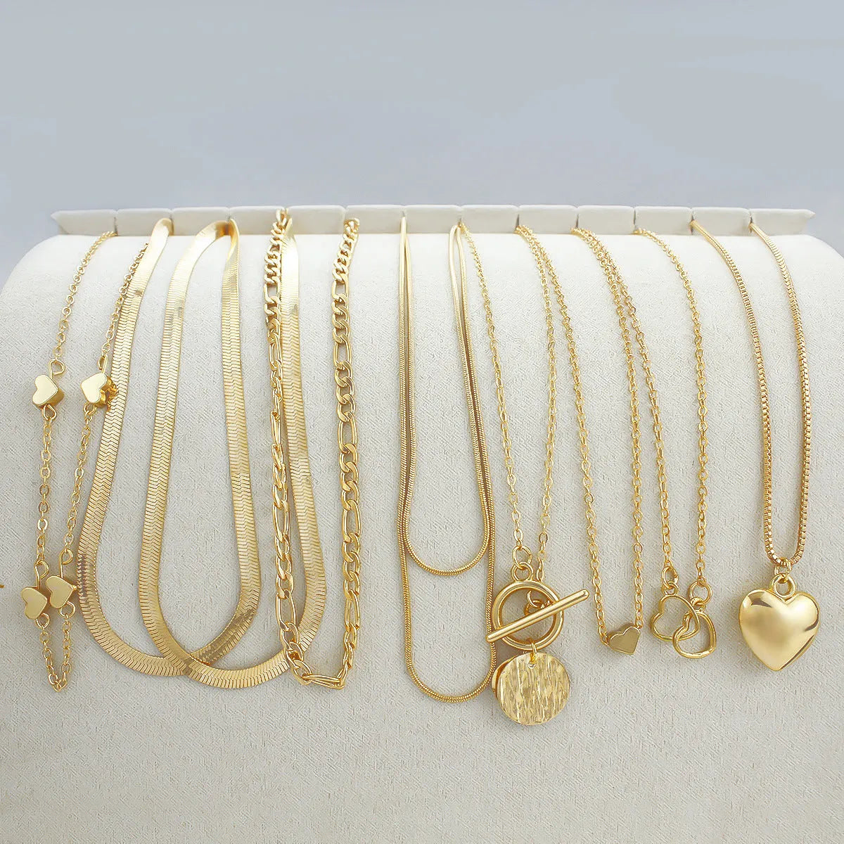 10 piece gold necklace set with snake bone chain and alloy pendants