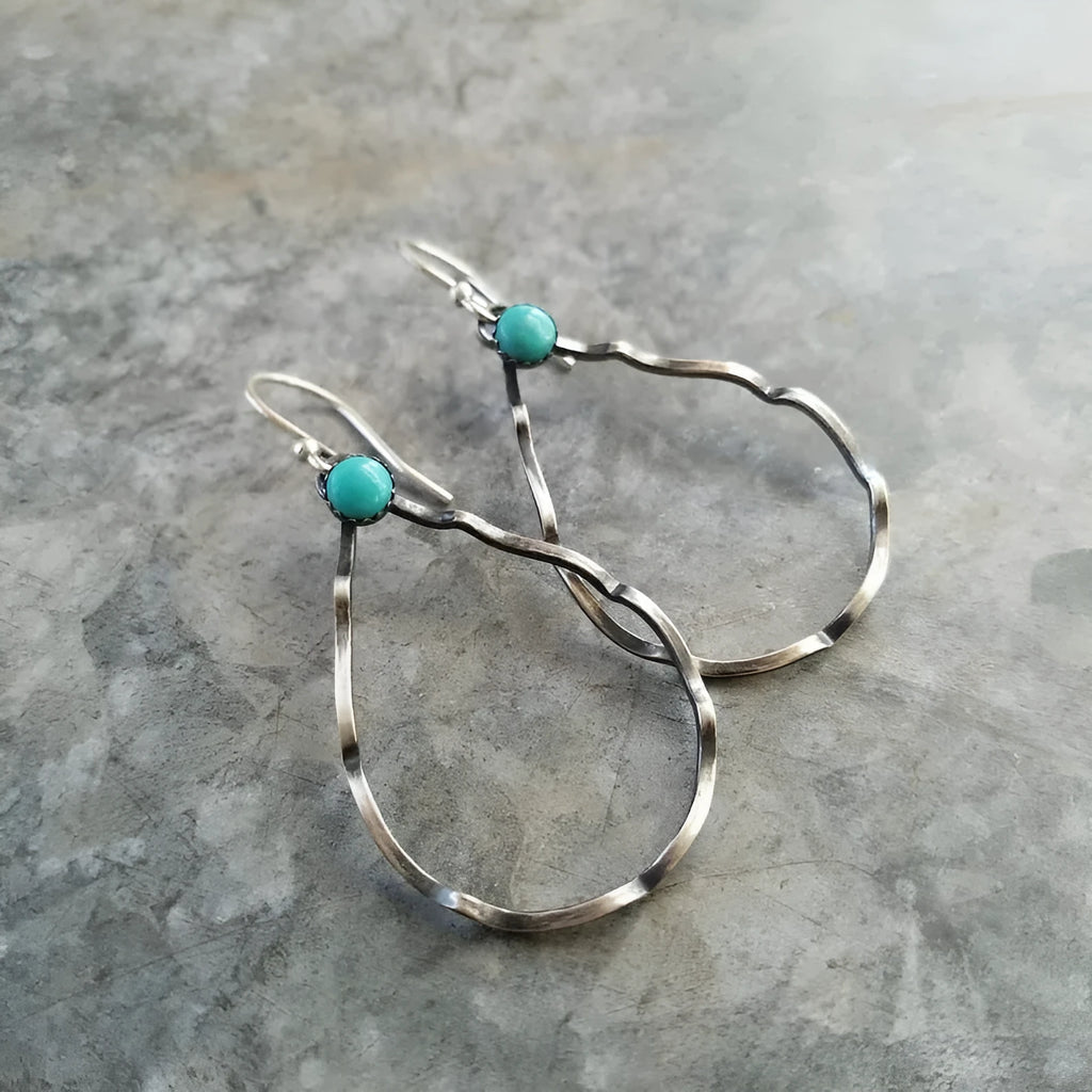 Vintage bohemian geometric circle earrings with turquoise detail in antique silver.