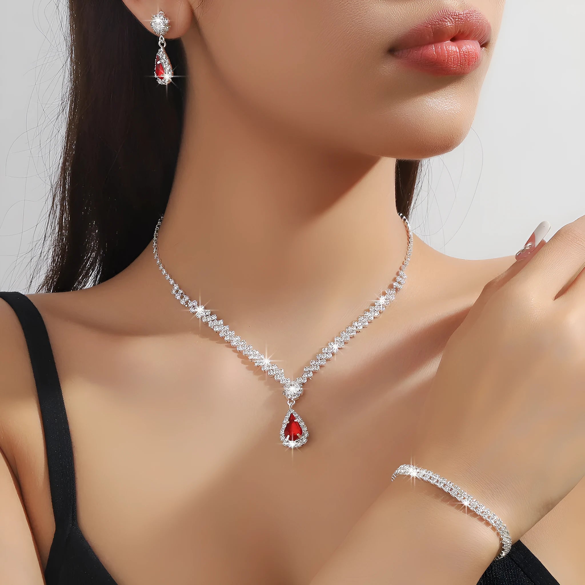 Women's claw chain necklace and earrings set with water drop rhinestones in blue colour option