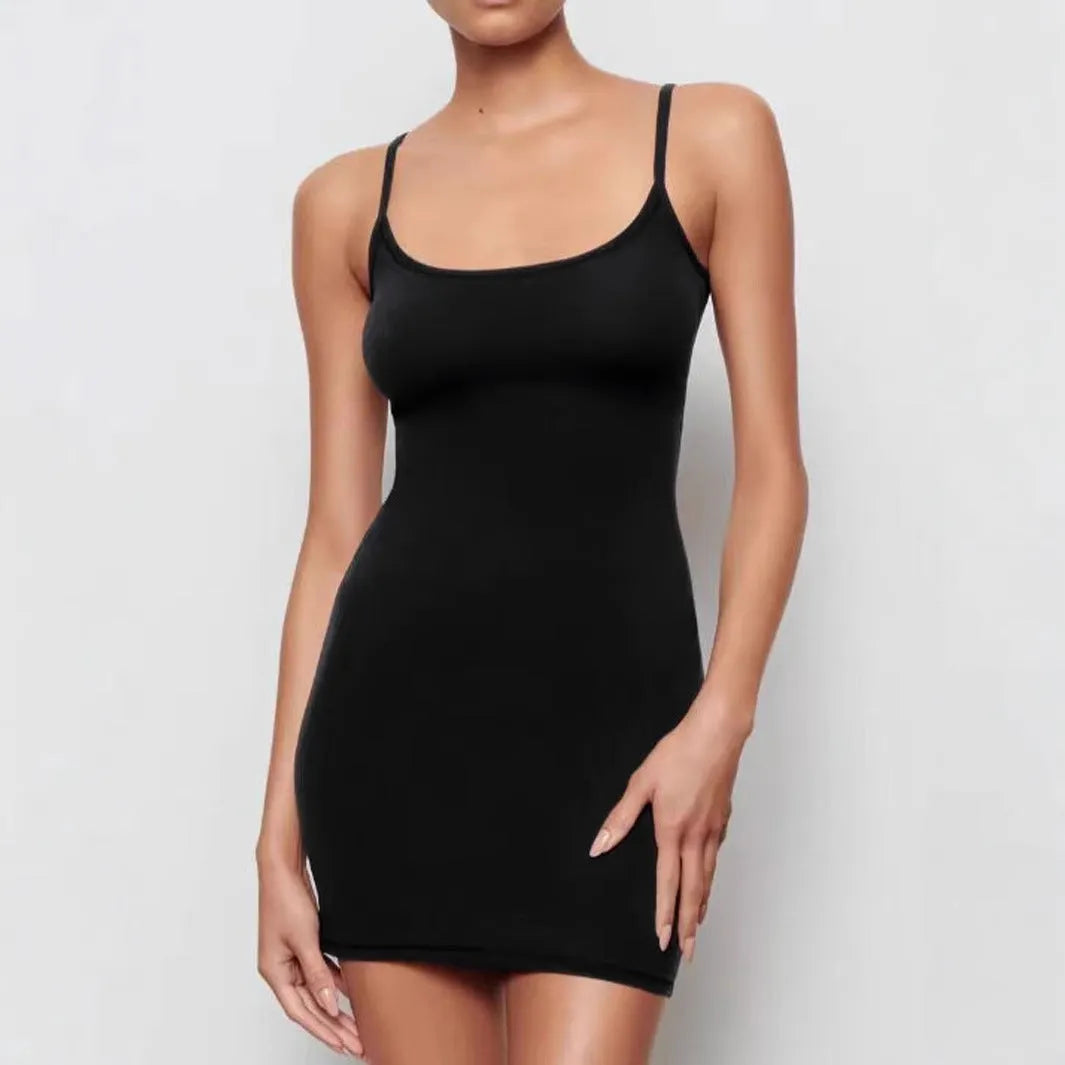 Black sling style sheath dress with sleeveless design and short skirt length