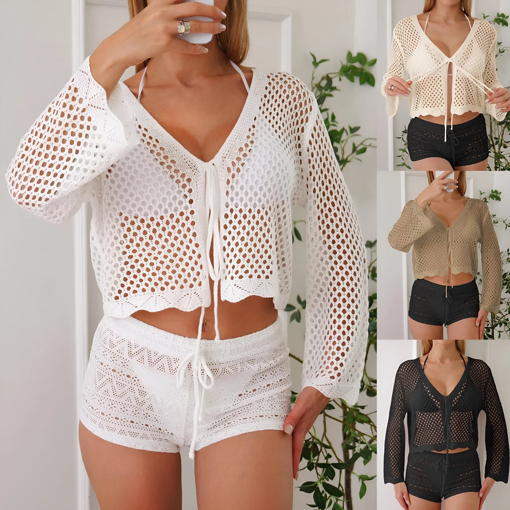 Short women's cardigan blouse with bell sleeves in a hollow woven cotton-like fabric.