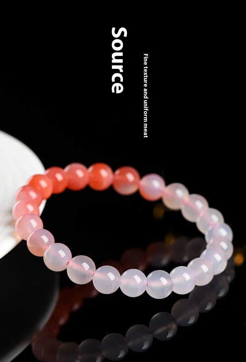 Natural gradient Yanyuan agate stone bracelet showing geometric beads in salt source colour, with size options.
