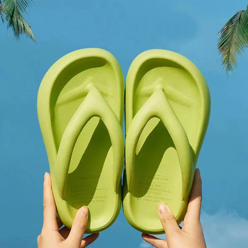 Solid colour women's flip-flops with a thick sole, decorative bow, and thong strap.