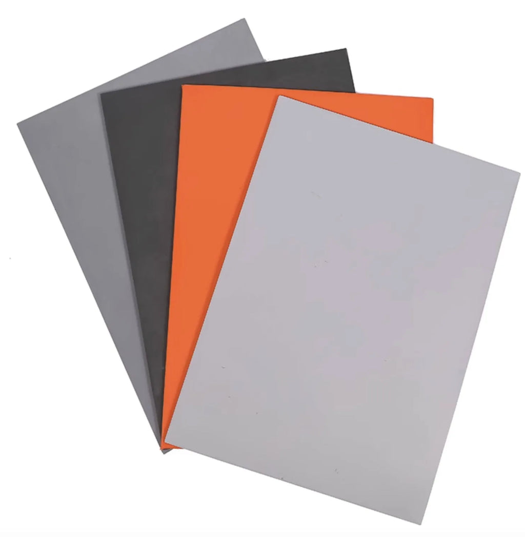 Dark gray laser engraving pad A4 size 23mm thick on workbench