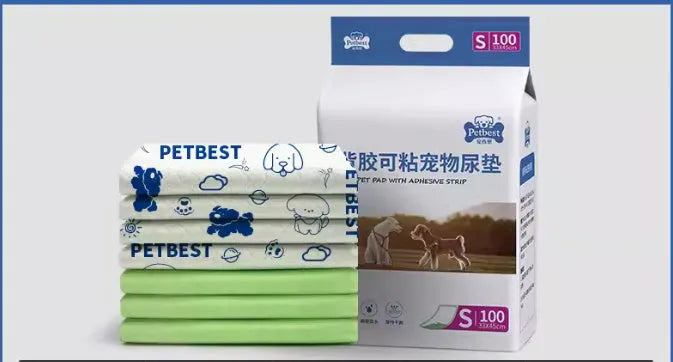 Pack of thickened dog urine pads showing adhesive strips and size comparison between S, M, L, and XL options