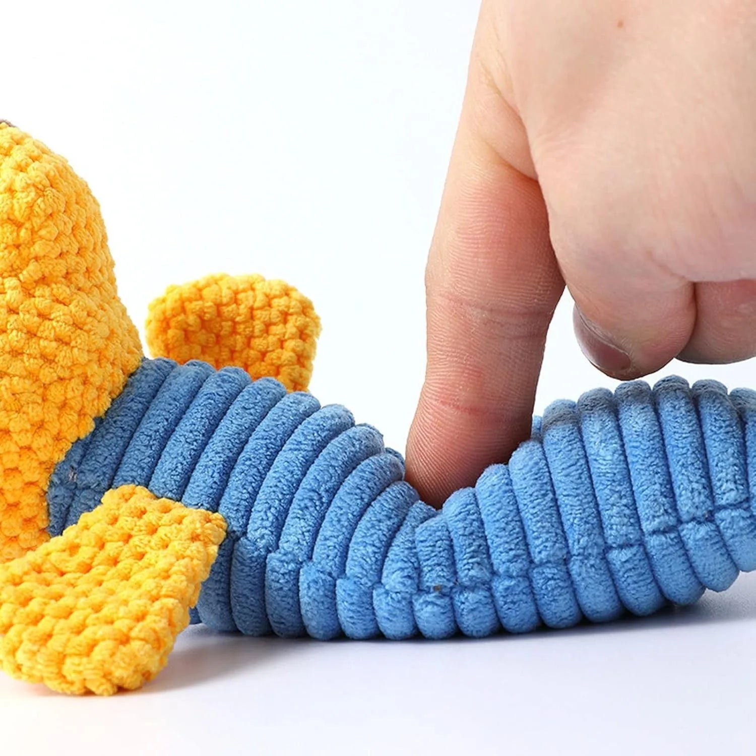 Plush dog squeaky chew toy in animal shape measuring 19cm long
