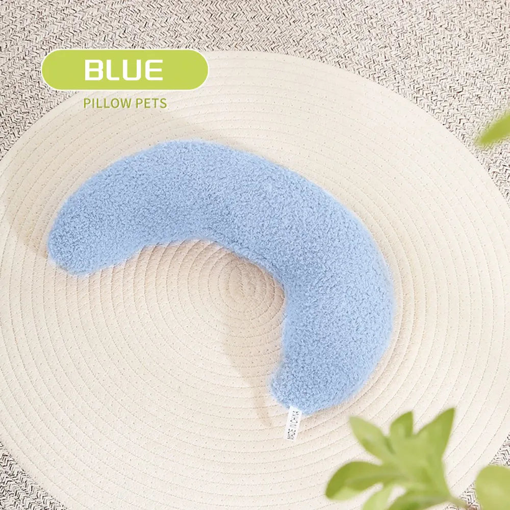 Blue U-shaped cat pillow with adjustable fabric collar for feline sleeping comfort