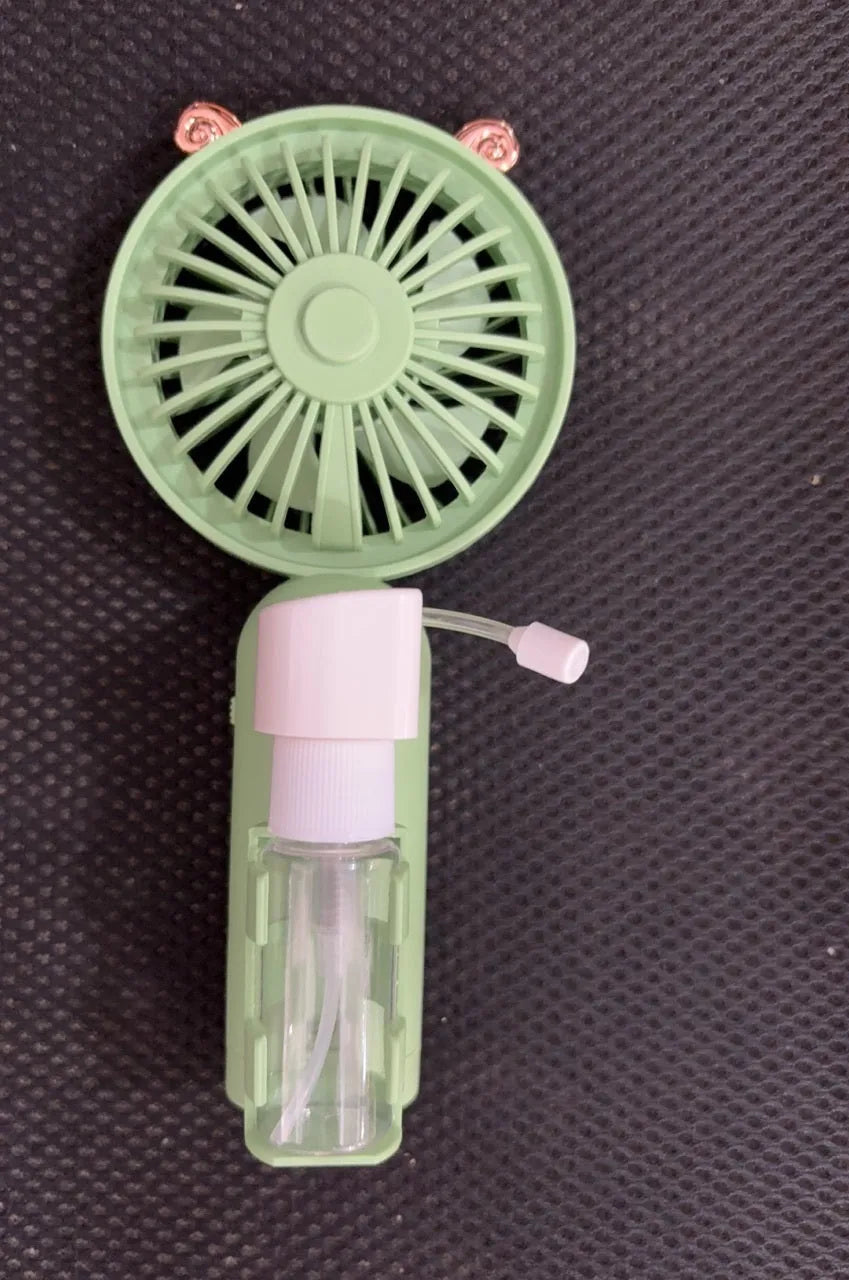 Personalised plastic USB desktop fan in choice of colours on a desk
