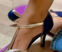 Women's round toe high heel shoe with button fastening in light blue and pink colour combination.