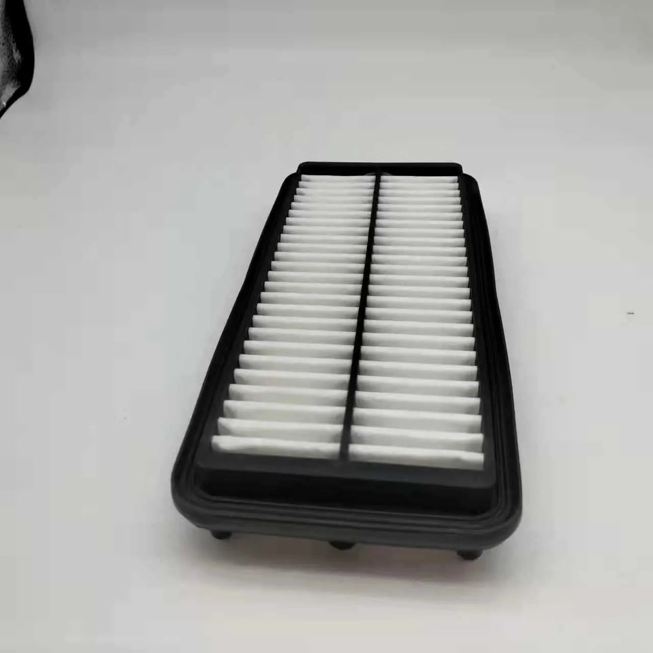 Rectangular black car air filter measuring 256mm by 113mm by 40mm for Modern vehicle applications