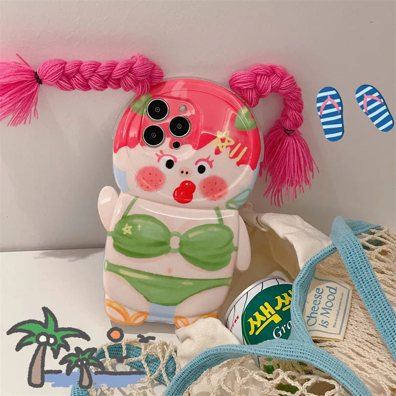 Pink and green silicone iPhone case with cartoon design of a girl in swimsuit with braids.