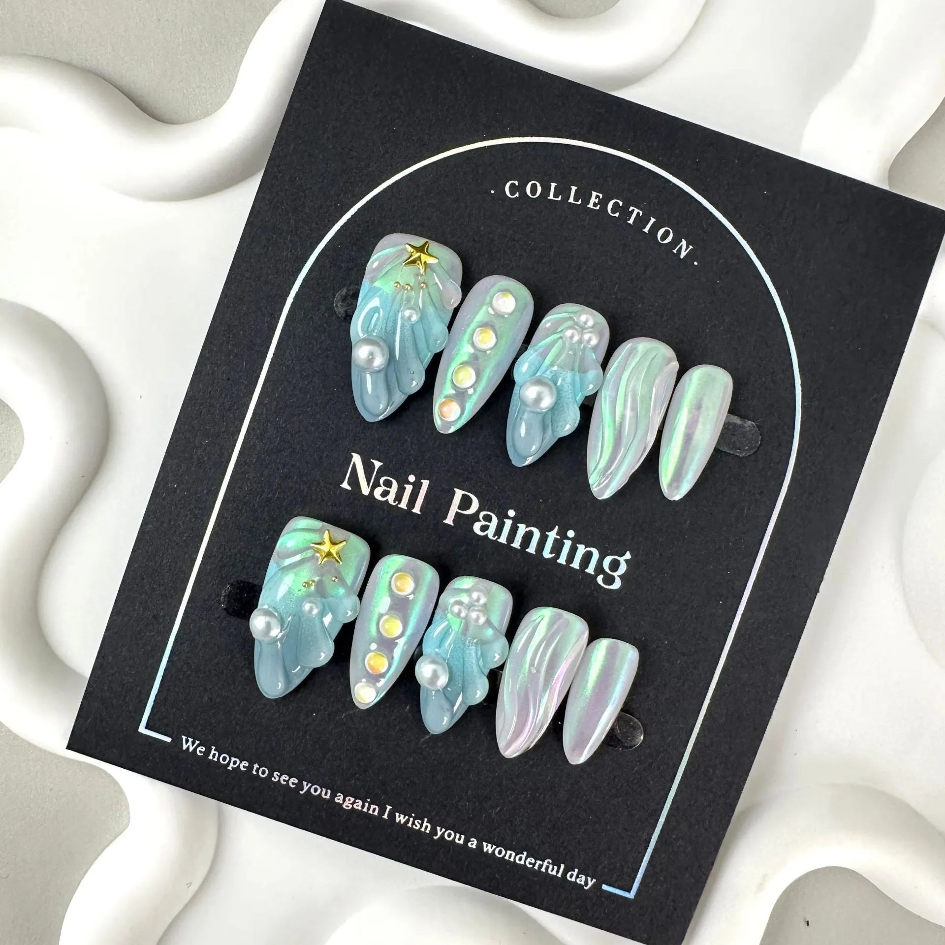 Blue plastic HAILANG shell nail stickers in XS S M L sizes for summer manicures