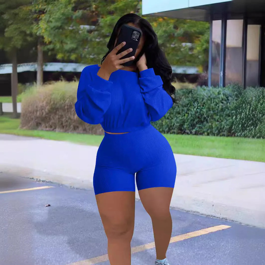 Women's off-shoulder top and matching shorts two-piece set in solid colour with sunken stripe pattern