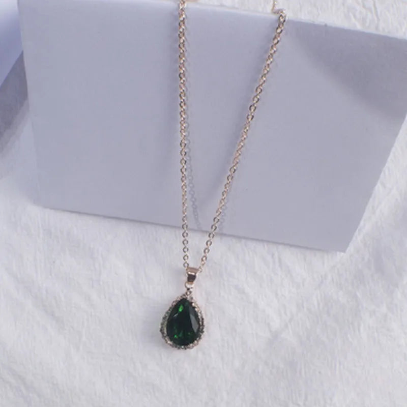 Rose gold plated drop pendant necklace with colourful rhinestones in a pink colour option.