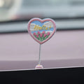 PVC cartoon duckling car decoration set with six small ducks and one Hello sign on a dashboard.