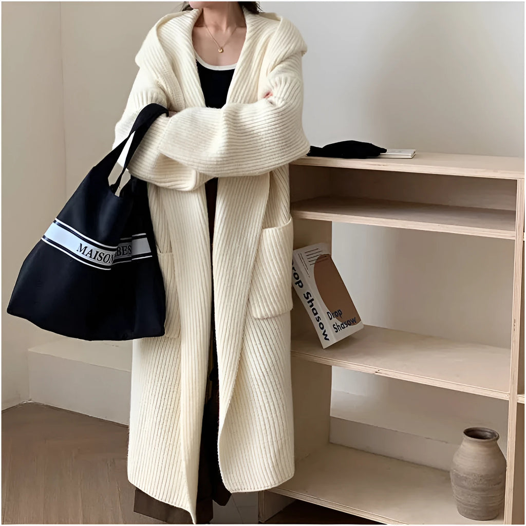Women's loose hooded cardigan coat in beige with raglan sleeves and extended length