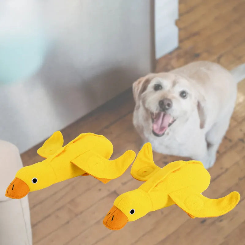 Yellow teddy pet toy with attached duck doll and built-in dog sound mechanism