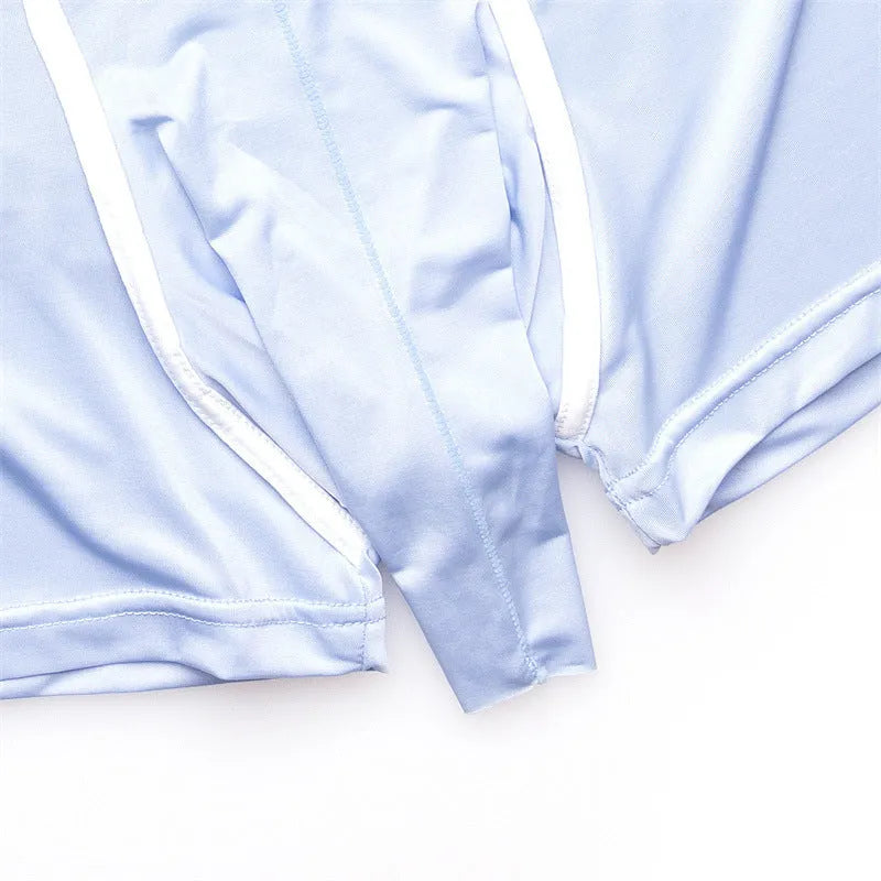 A pair of solid colour men's ice silk boxers laid flat, showing the mid waistband design.