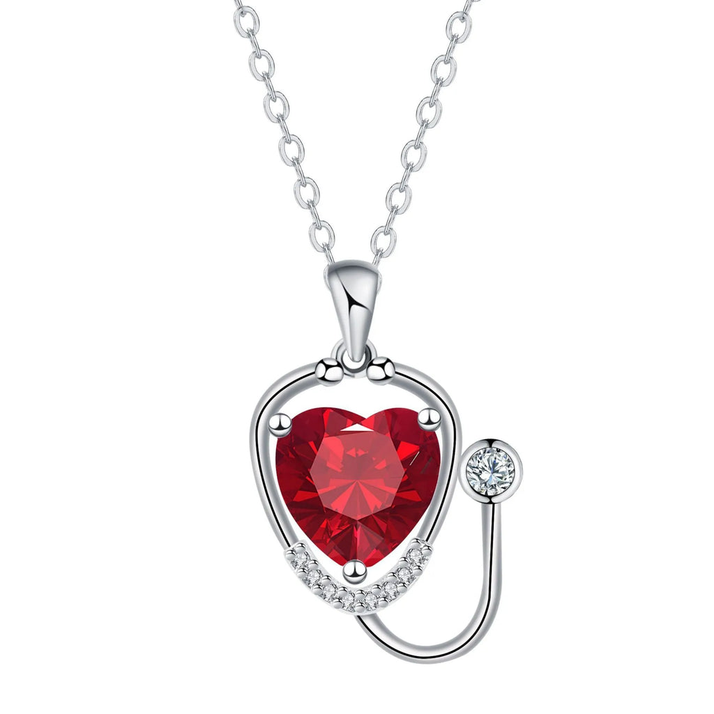 Women's fashion necklace with wings, cross and stethoscope design in red diamond colour on copper