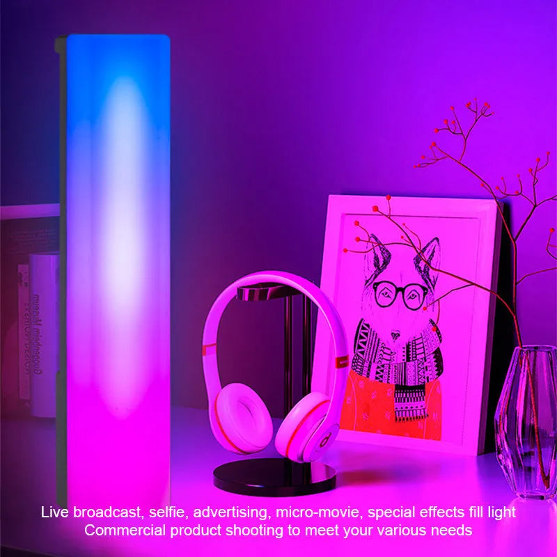 Black and white 3D RGB tabletop ambiance lamp with voice-activated rhythm lights for gaming and decor.