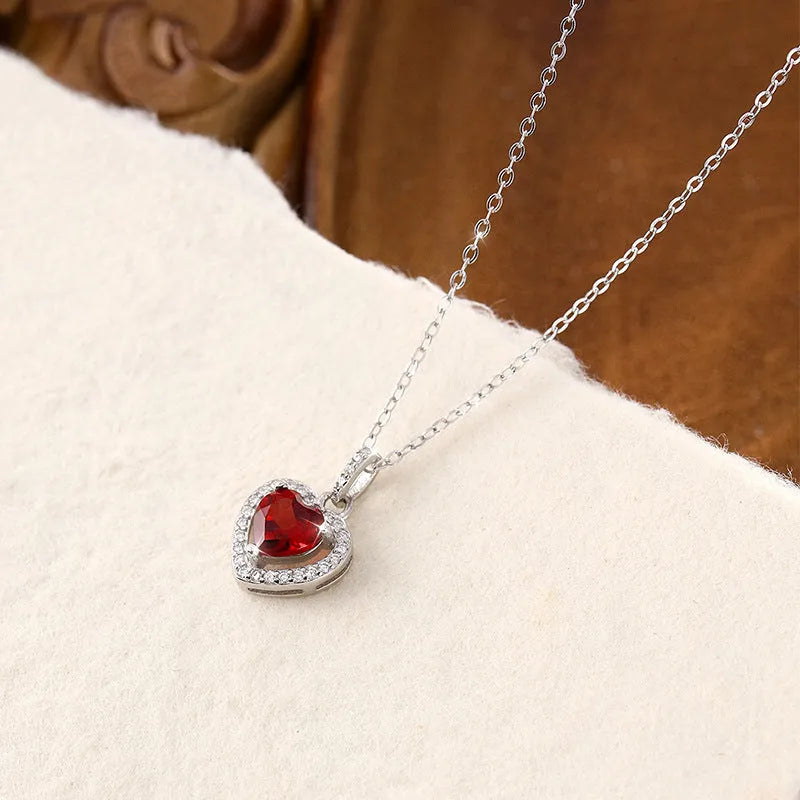 S925 sterling silver heart necklace with natural gemstone pendant on an adjustable cross chain.