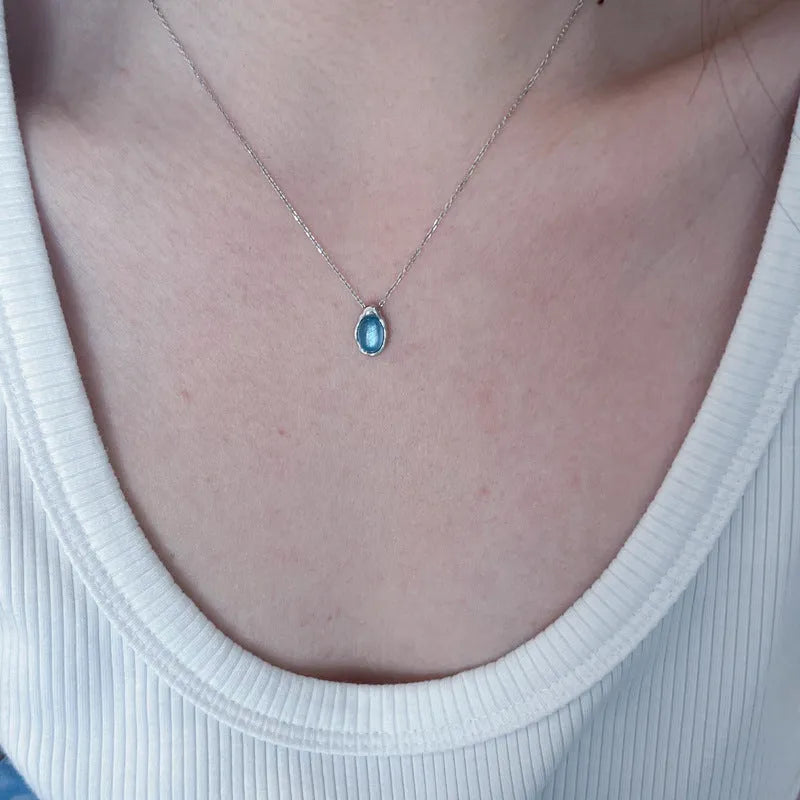 Navy blue water drop geometric pendant on adjustable copper chain with platinum colour finish