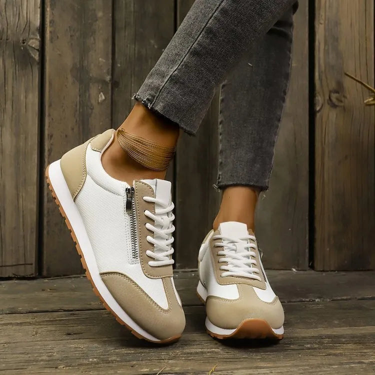Women's flat-heeled shoes in champagne, grey, and white colours showing lightweight artificial PU uppers and rubber soles